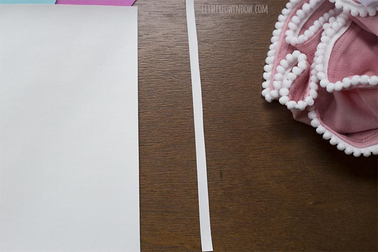 one quarter inch strip of white faux leather cut from sheet