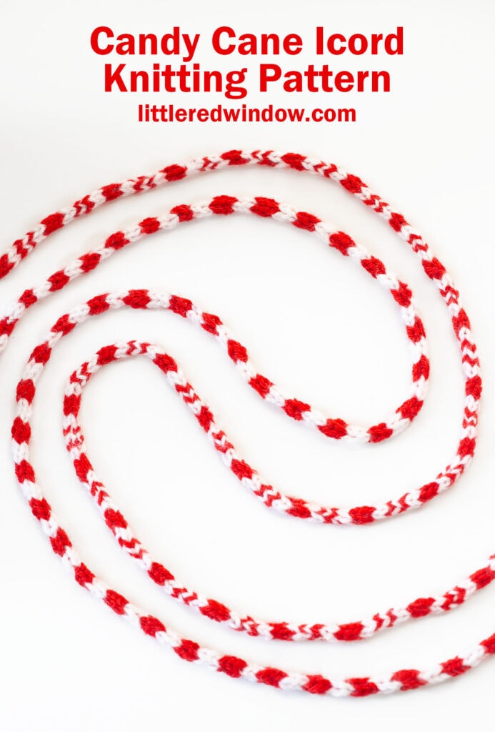 Red and white striped knitted candy cane icord, artfully curved on a white background. Text above reads,
