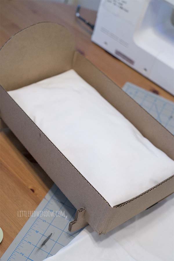How to make a DIY Doll Crib from an old cardboard box!
