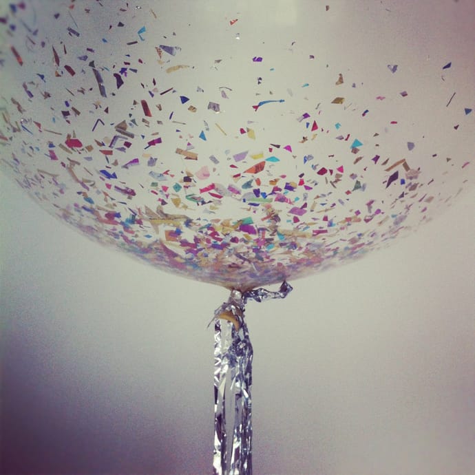 Clear baloon with colorful confetti inside