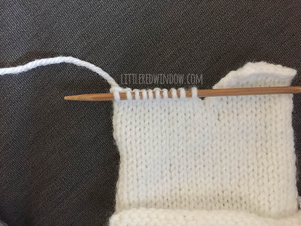 Cozy Penguin Hat Knitting Pattern, adorable for babies and toddlers! | littleredwindow.com