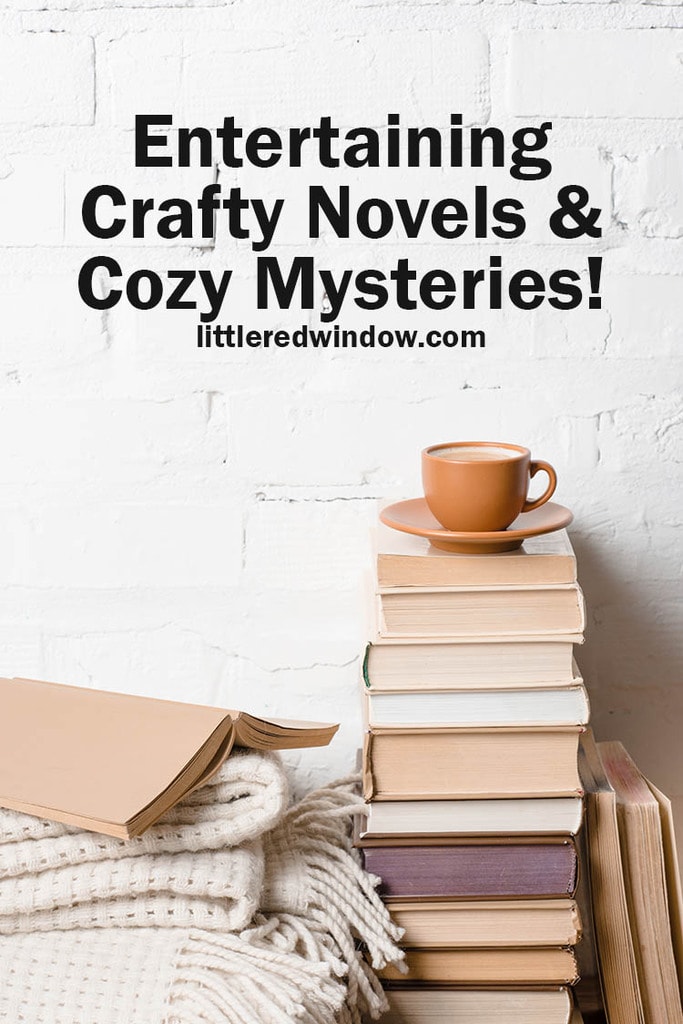 sack of tan books with brown teacup and saucer on top and an off white blanket folded next to them in front of a white brick wall