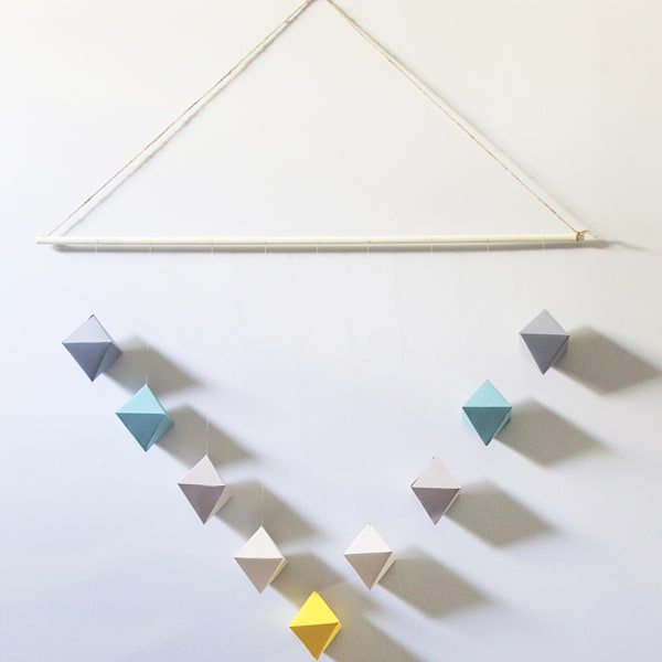 wall hanging made from paper geometric shapes