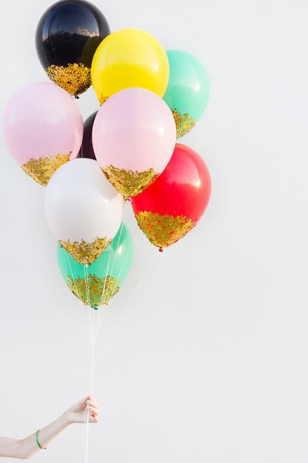 bunch of balloon dipped in gold glitter