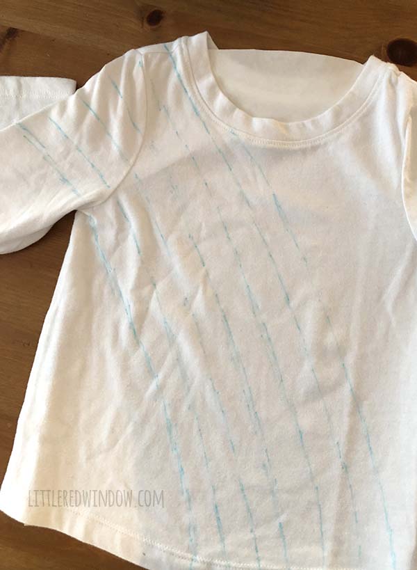 DIY Rainbow Costume for Kids! Get instructions to make this adorable costume including rainbow shirt, cloud tutu, raindrop leggins and sun hair clip!