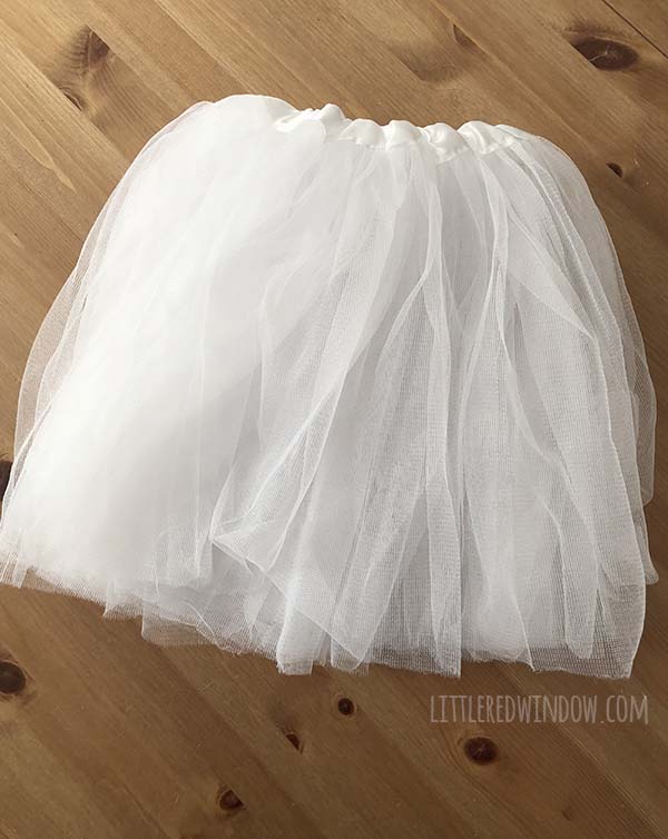 DIY Rainbow Costume for Kids! Get instructions to make this adorable costume including rainbow shirt, cloud tutu, raindrop leggins and sun hair clip!