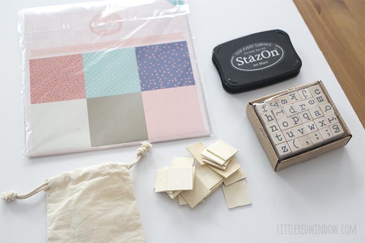 You only need a handful of supplies including scrapbook paper and stamps to make your own DIY travel matching game