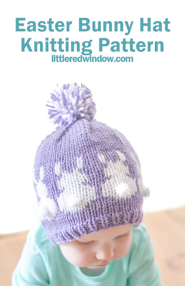 A baby sporting an adorable purple knit Easter Bunny Hat adorned with white bunny silhouettes and a playful pom-pom on top. The text above reads, 