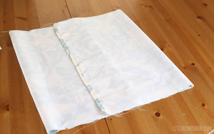 10 Minute DIY Pillow Cover with buttons! You won't believe what it's made from! | littleredwindow.com