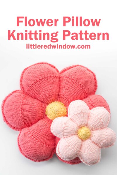 large medium pink and small light pink knit flower pillows both with light yellow centers on a white background