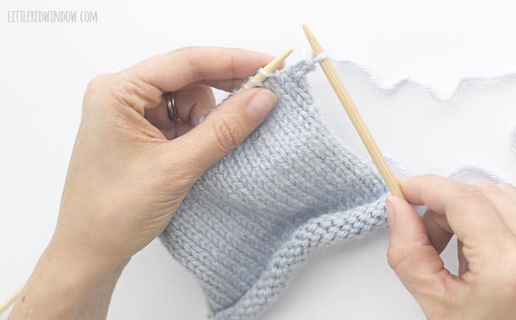 To bind off knit stitches, use the tip of the left needle to lift the first stitch up and over the second stitch and off the right needle