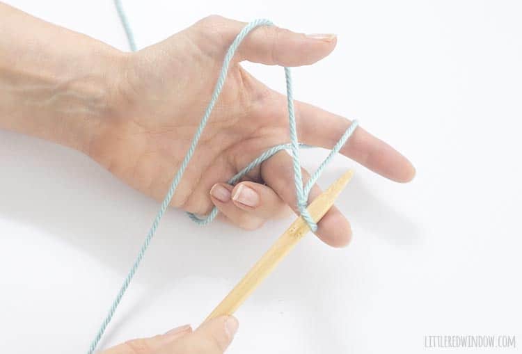Learn the correct way to hold the yarn with your left hand for a long tail cast on