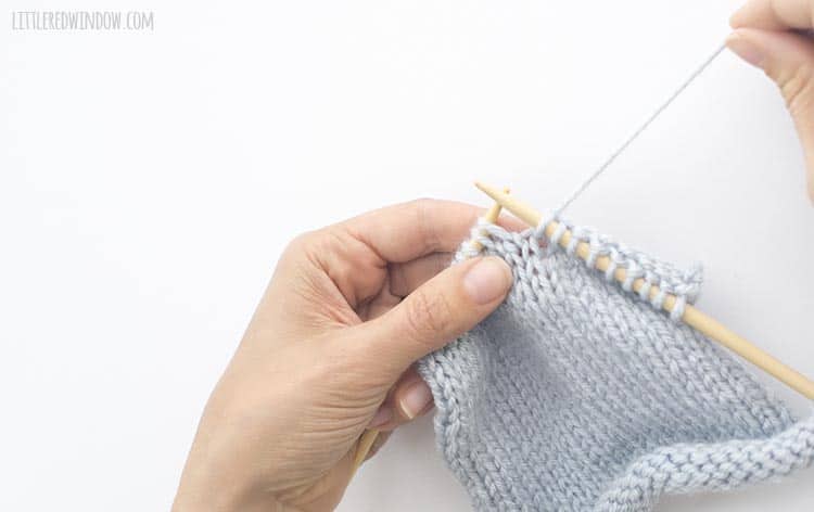 To k2tog, start with the yarn behind your work