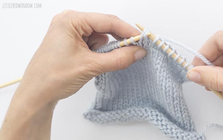 To ssk, insert the left needle back through the front of the two slipped stitches from left to right