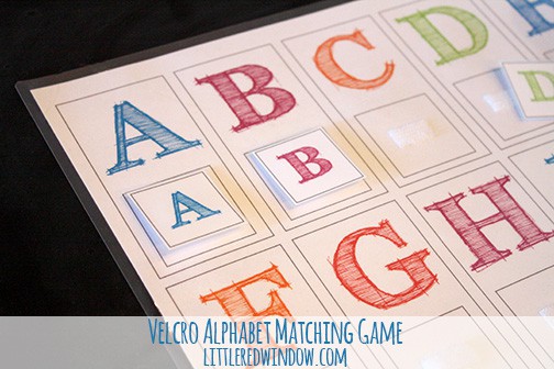Closeup of letters A and B and the matching letter tiles