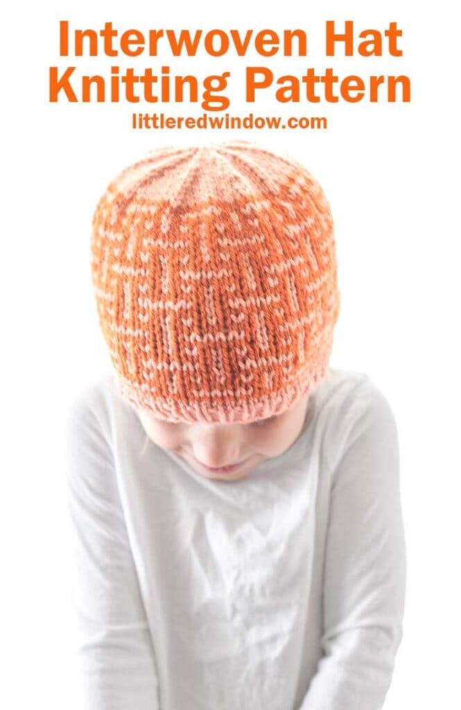 A child in a white shirt wears an orange interwoven hat with a textured, knit pattern against a white background. The text