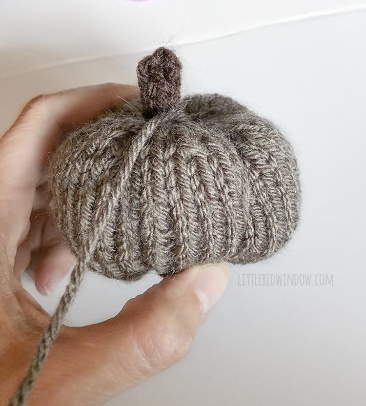 Use the yarn needle to shape your adorable knit little pumpkins!