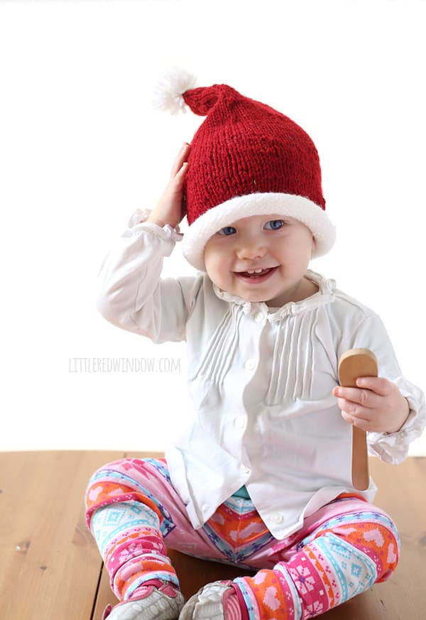 Little Santa Hat Knitting Pattern, a simple pattern for your little one for the holidays! | littleredwindow.com