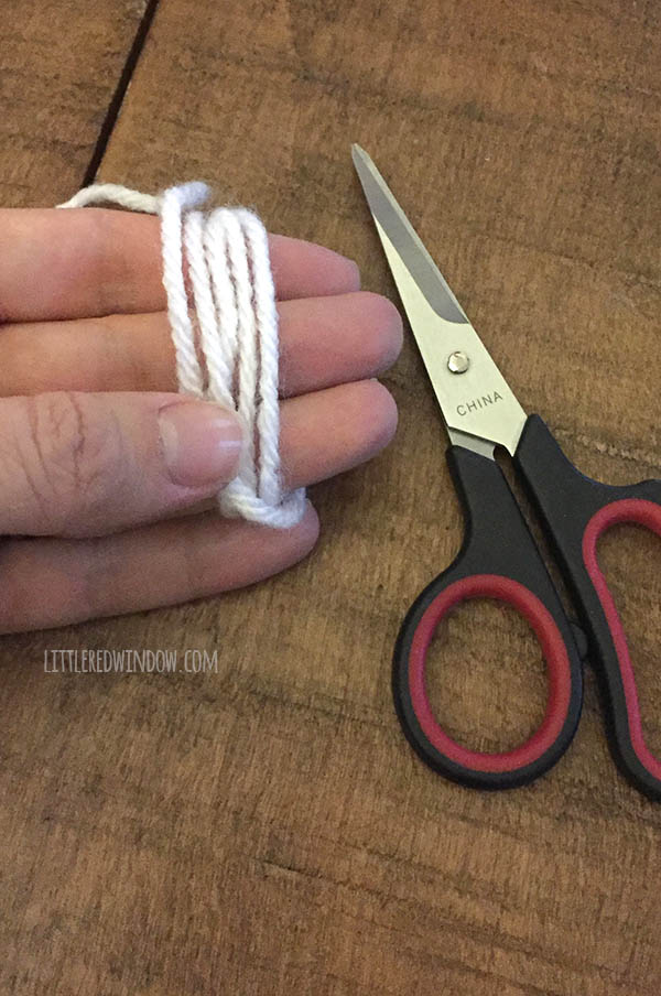 Little Santa Hat Knitting Pattern, a simple pattern for your little one for the holidays! | littleredwindow.com