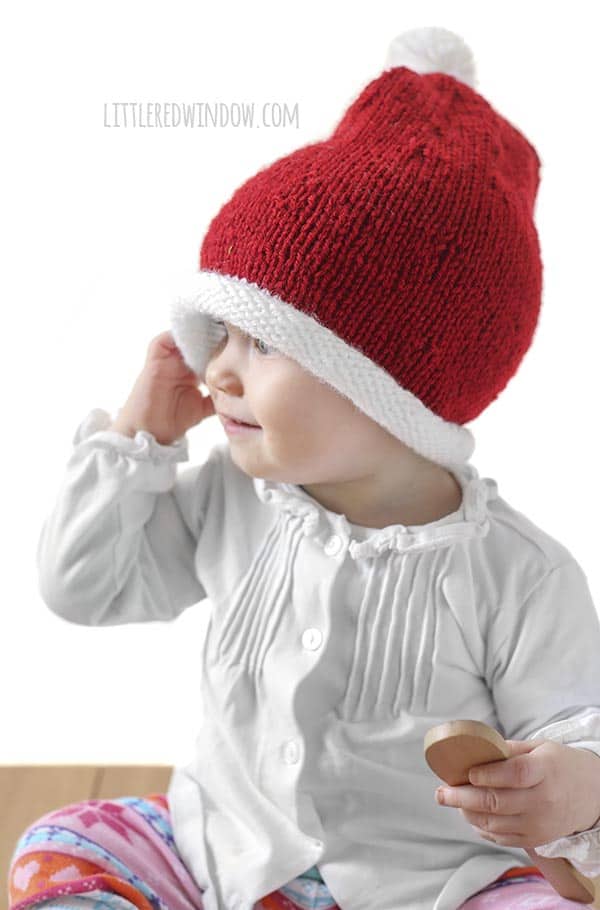 Little Santa Hat Knitting Pattern, a simple pattern for your little one for the holidays! | littleredwindow.com