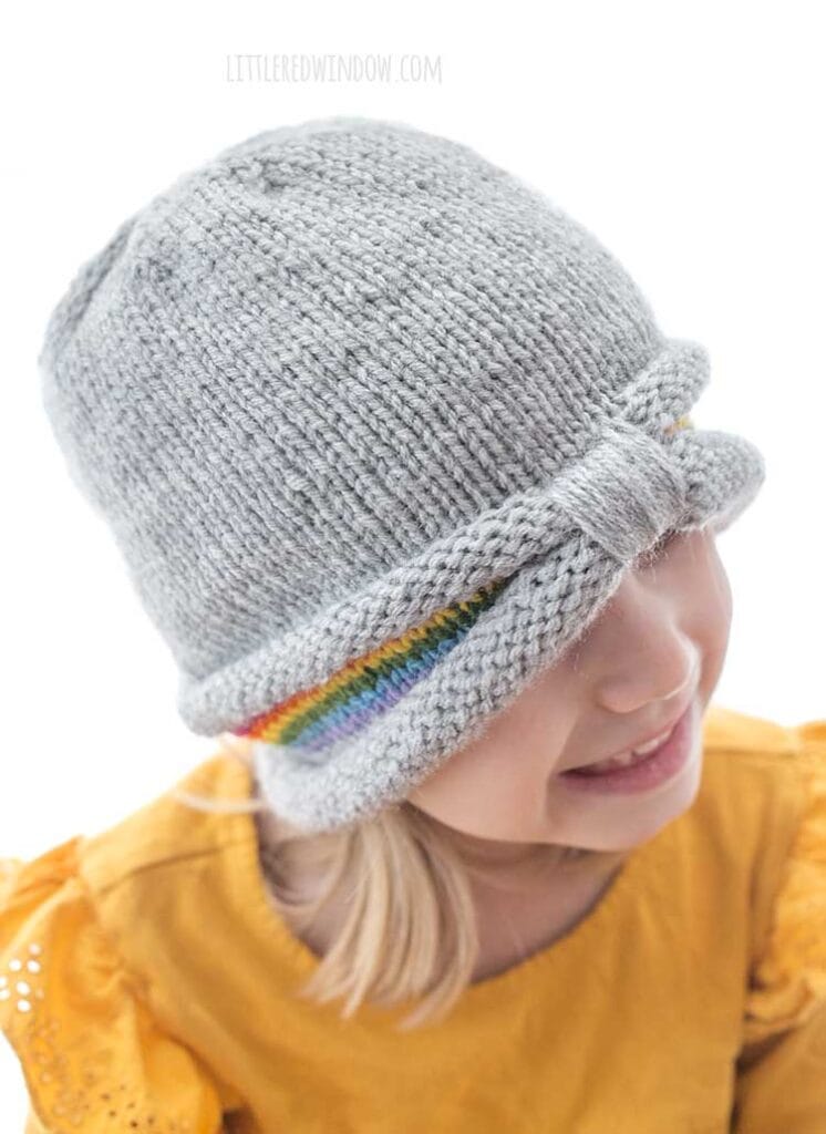 closeup from slightly above of the gathered brim on the peekaboo rainbow hat knitting pattern