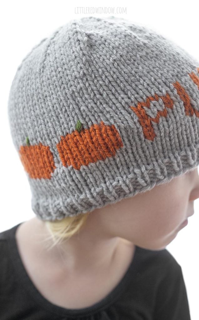 This cute Halloween Punkin Hat knitting pattern is a fun fair isle pattern with a row of cute pumpkins on the back!