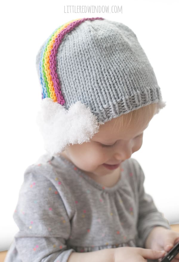 Over the Rainbow Hat Knitting Pattern for babies and toddlers with cute rainbow headband fluffy cloud earflaps! | littleredwindow.com