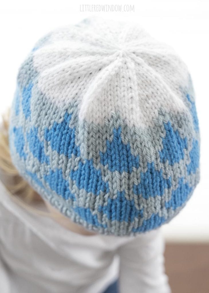 top view of raindrop hat knitting pattern on little girl