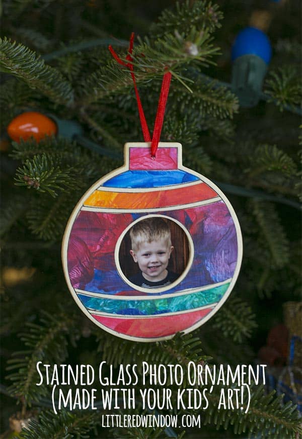 Use your kids' artwork to make this beautiful stained glass photo ornament for Christmas!