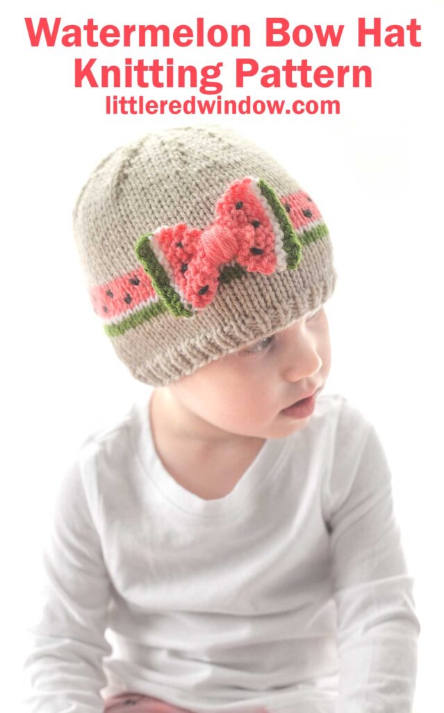 A child wearing a knitted bow hat with a watermelon design sits facing slightly to the left. The hat is beige with pink, green, and black watermelon slice details. Text above the child reads 
